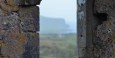 Castle ruins at Ballinalacken Castle Country House Hotel (Cliffs of Moher in background)